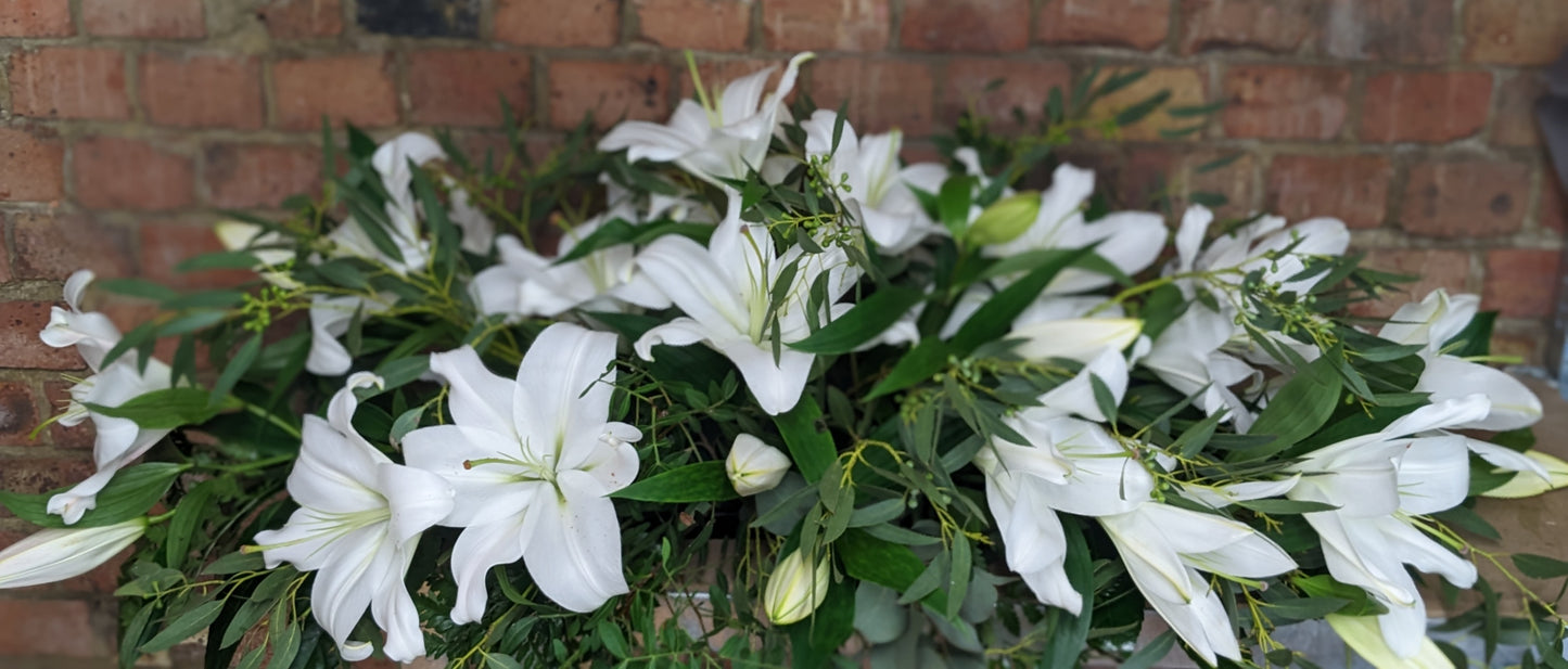 Lily Casket - Quality Flowers from Ann's Flowers - Just £100! Shop now at Ann's Flowers