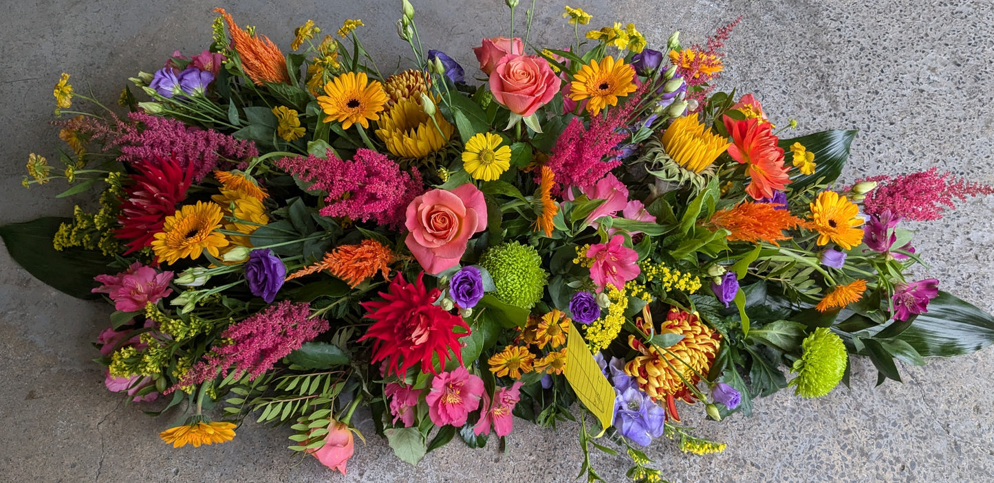 Vibrant seasonal casket - Quality Flowers from Ann's Flowers - Just £150! Shop now at Ann's Flowers