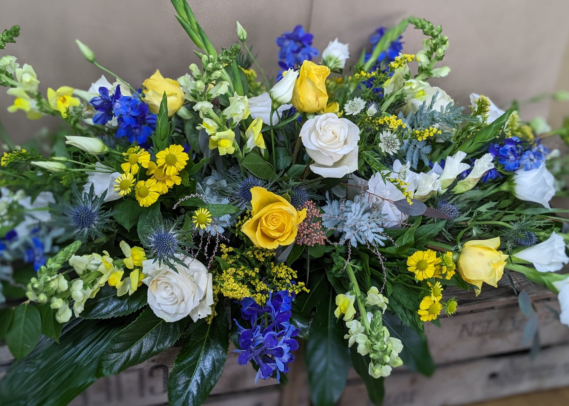 Casket spring colours - Quality Flowers from Ann's Flowers - Just £135! Shop now at Ann's Flowers